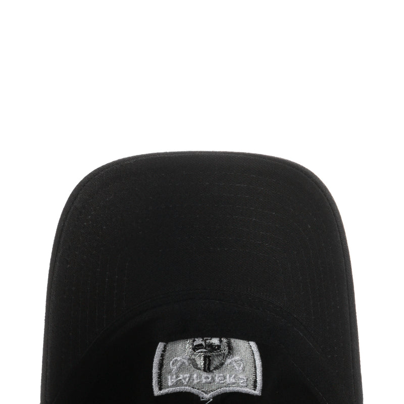 Black Raiders baseball cap close-up with white and gray front logo patch