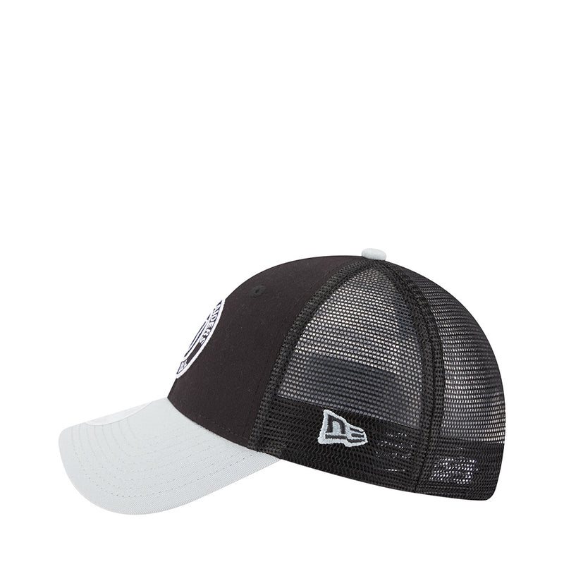 Black and gray mesh trucker cap with side New Era flag logo and textured crown