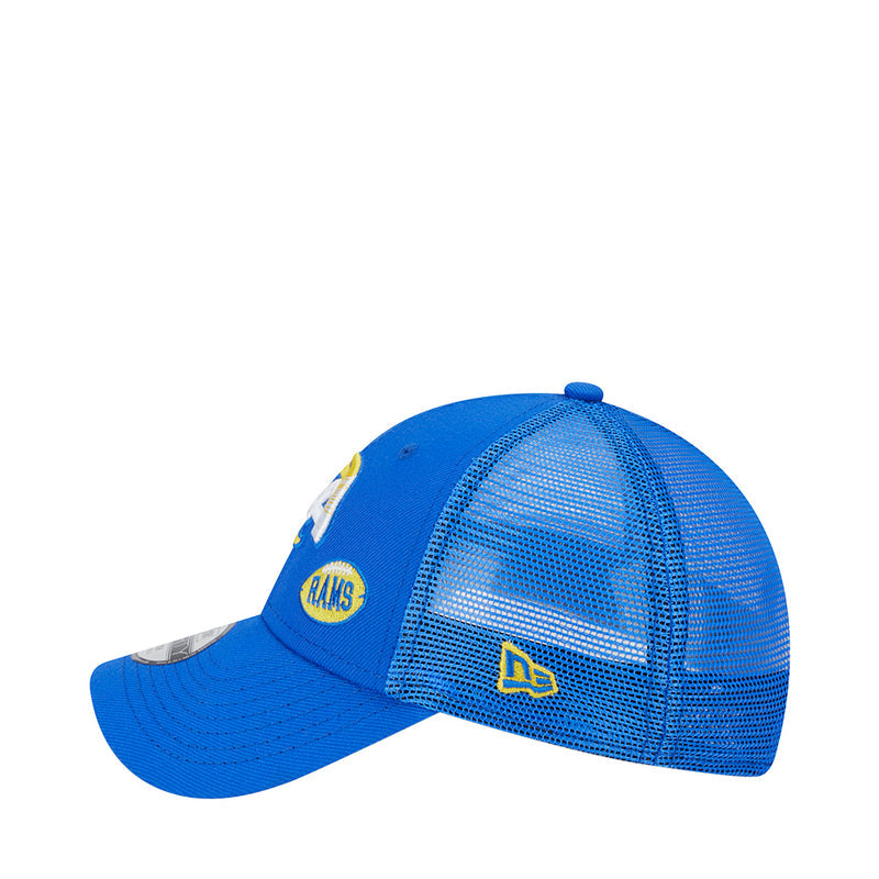 Blue trucker cap with mesh back panel and Rams circular logo patch
