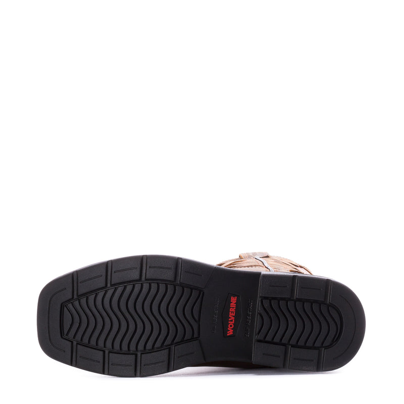 Boot outsole with black tread and Wolverine logo, underside view