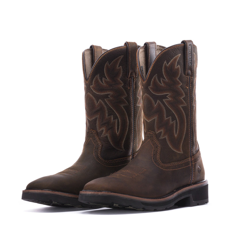 Pair of men's dark brown cowboy boots with embroidered shaft and rubber outsole