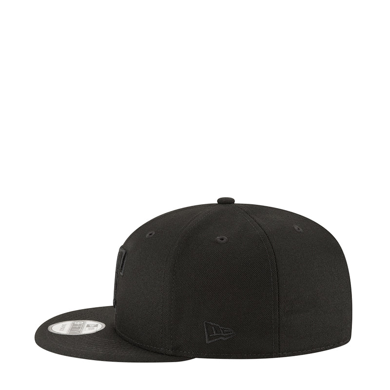 Black baseball cap with small side logo and curved brim