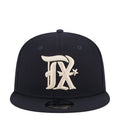 Navy junior baseball cap with large embroidered Rangers-style logo on front panel