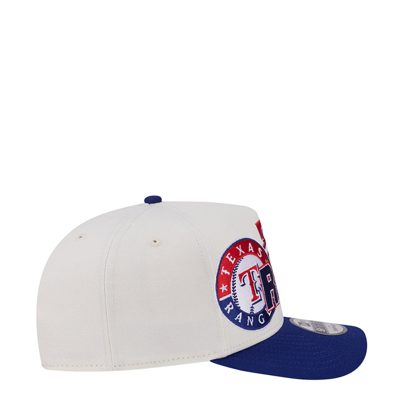 Two-tone A-frame cap with cream crown, navy brim, and embroidered side patch