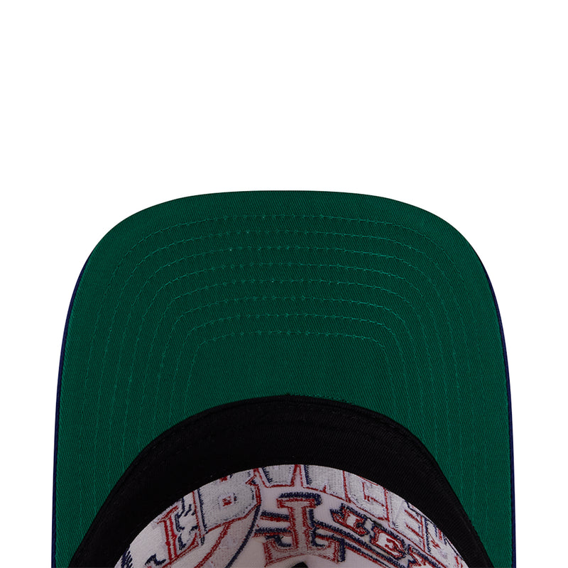 Green cap top panel with stitched texture and black inner trim
