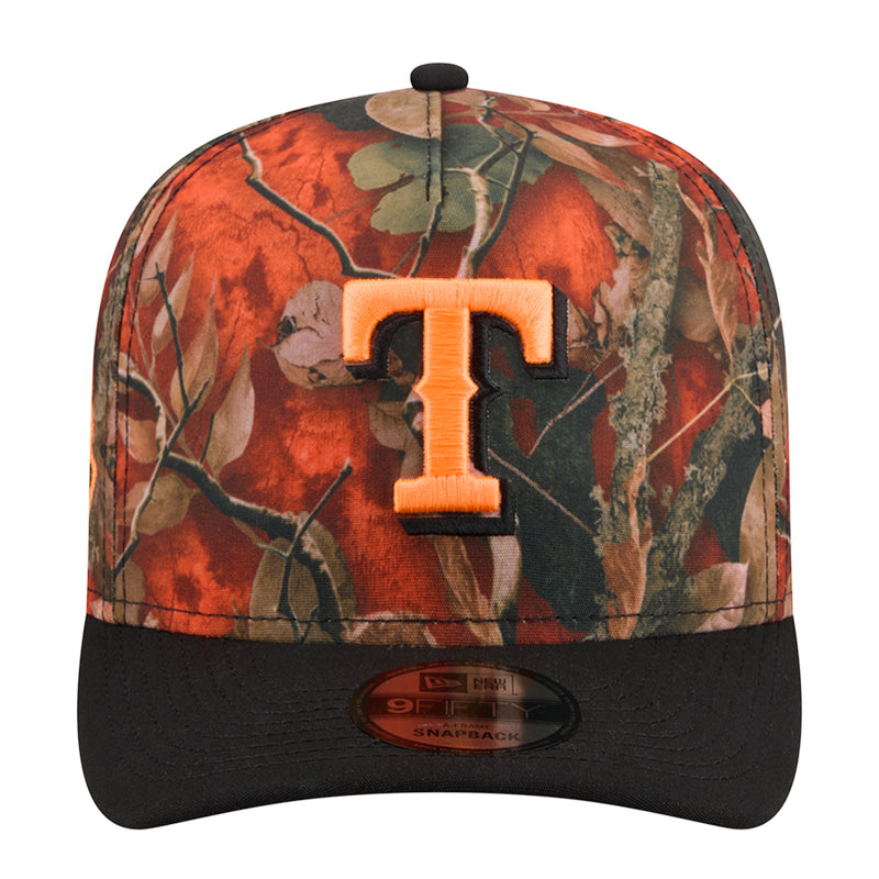 Two-tone A-frame camo baseball cap with orange tree-leaf pattern and black front