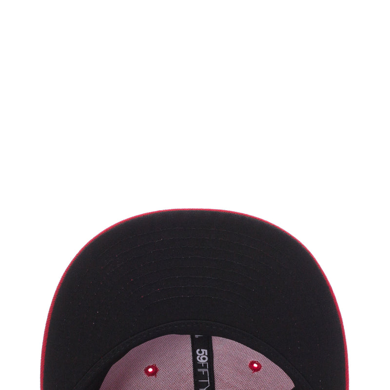 Black 59FIFTY cap close-up with interior band and 59FIFTY label