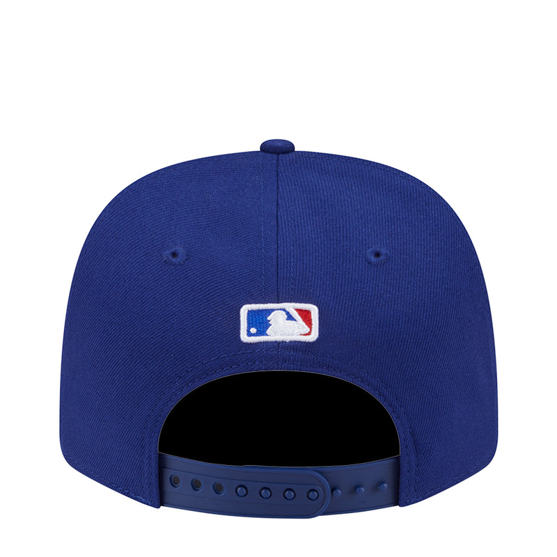 Blue baseball cap back view with stitched team logo and snapback strap