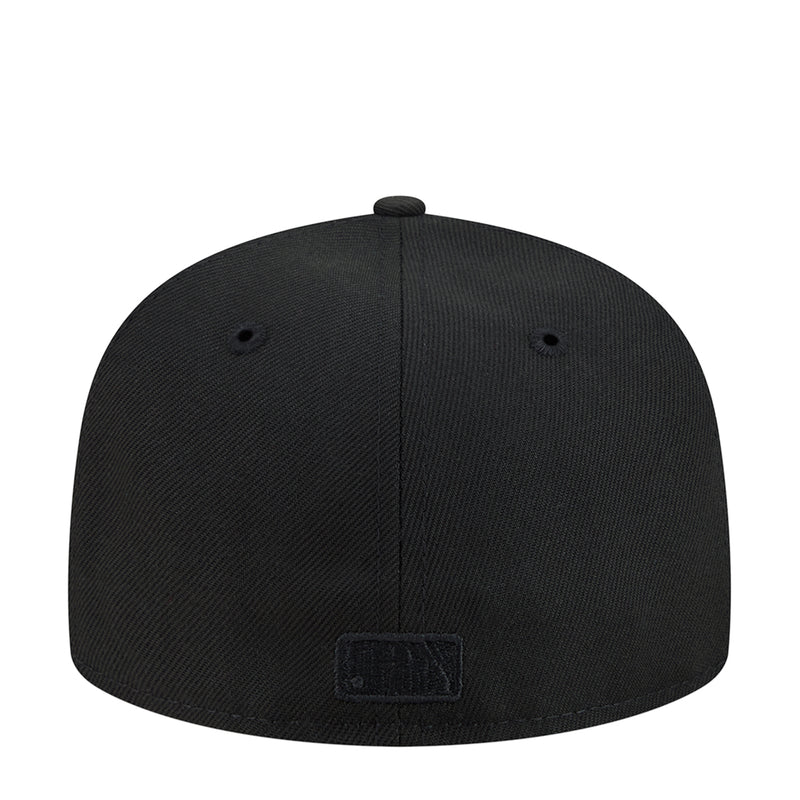 Black baseball cap showing back seam and small embroidered logo patch