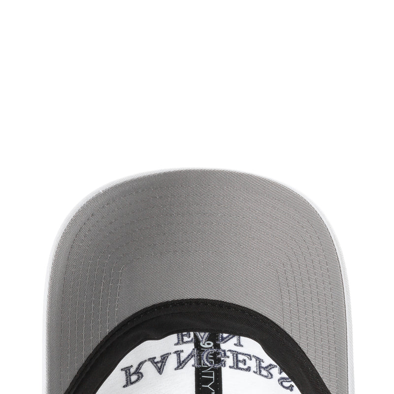 Gray cap interior close-up with black circular trim and partial logo