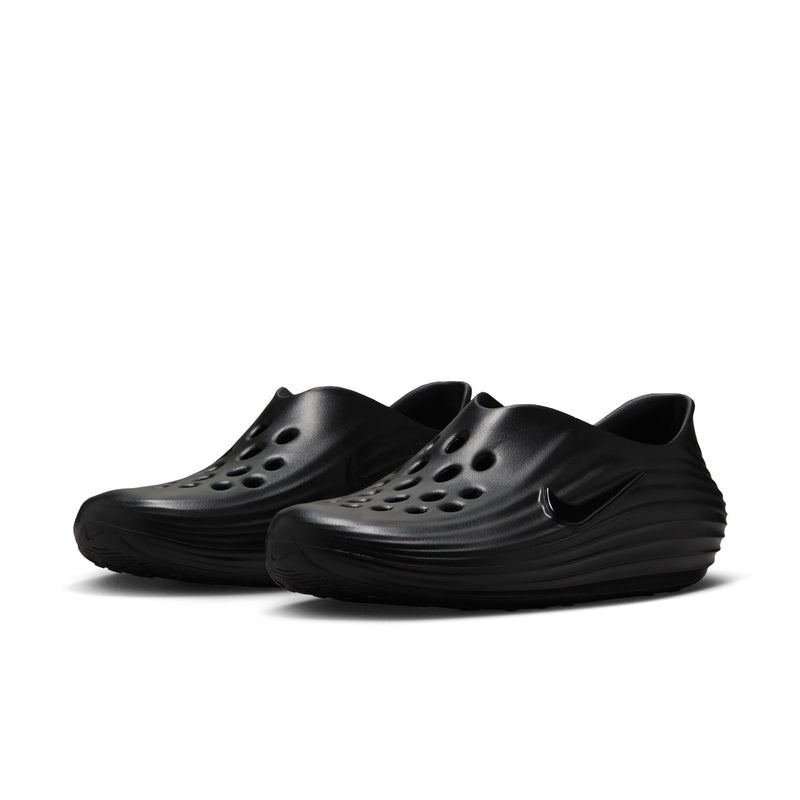 Black pair of slip-on clogs with toe perforations and molded side ridges.