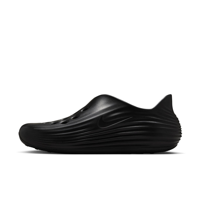 Black slip-on clog with molded side ridges, swoosh-style logo, and toe perforations.