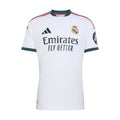 White Real Madrid home jersey for men with teal trim and red shoulder stripes