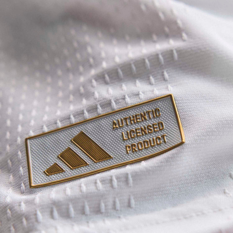Authentic Licensed Product woven label on white jersey