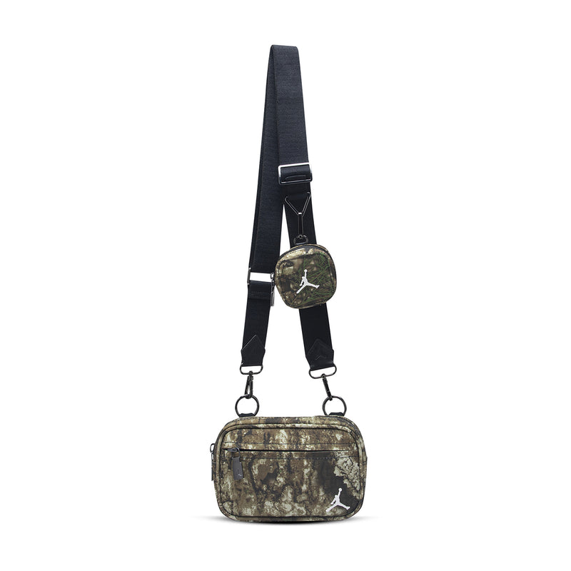 Olive camo sling-style camera bag with dual strap and crossbody carry