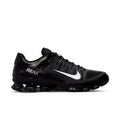 Men's black training shoe with white Nike swoosh and chunky tread sole.