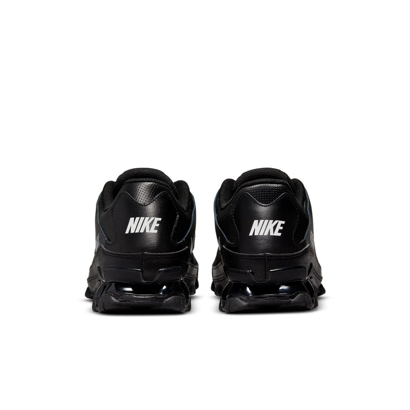 Men's black Nike Training shoe, padded heel with mesh panel and rear swoosh.