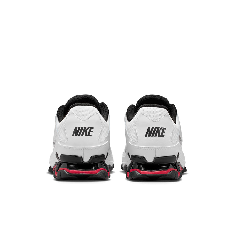 Men's white training shoes rear view with NIKE logo and red-trimmed heel sole