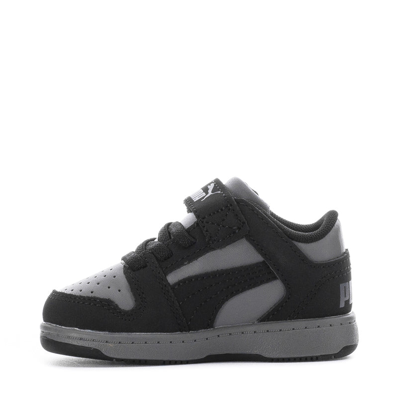 Toddler black PUMA sneakers, side view with hook-and-loop strap and contrast sole