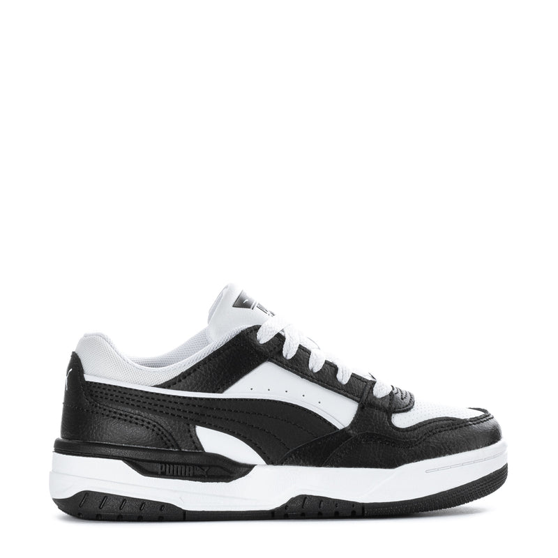 Kids low-top sneakers in black and white with white laces and Puma logo