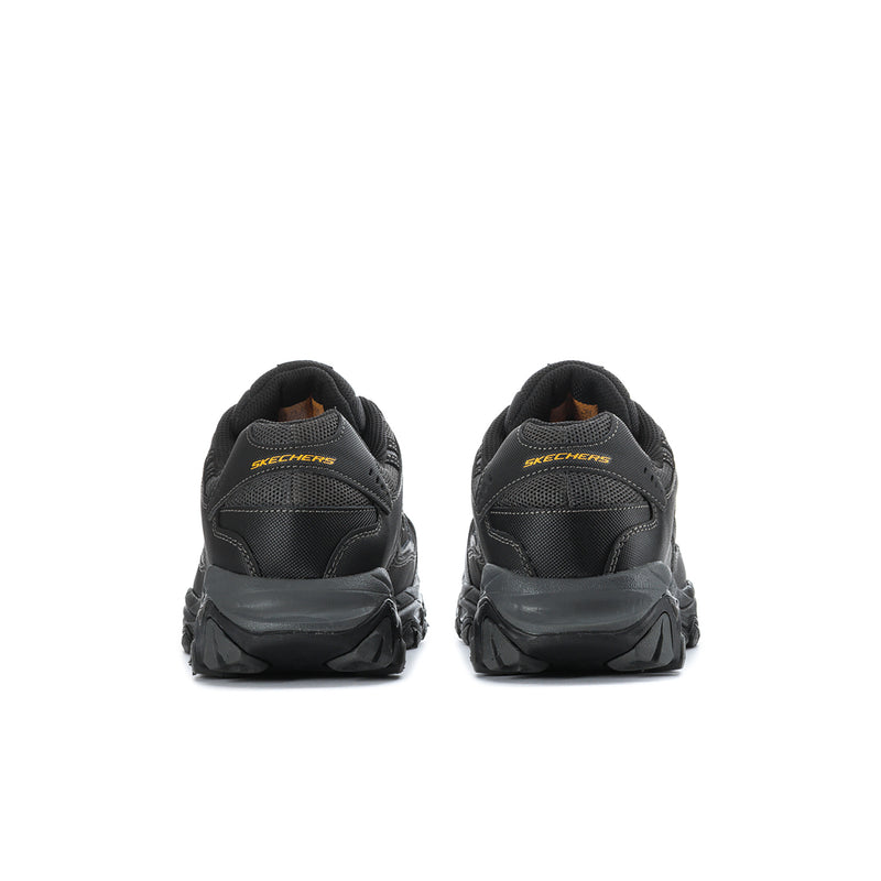 Men's black steel-toe sneakers, back view with pull tab and cushioned heel