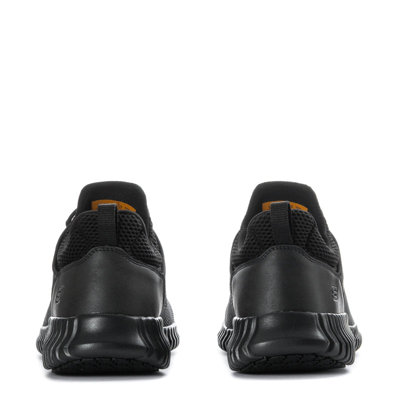 Men’s black athletic sneaker heel view with cushioned back and ribbed sole details