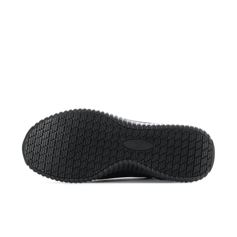 Black rubber outsole with grid tread pattern and center logo, one sneaker bottom view