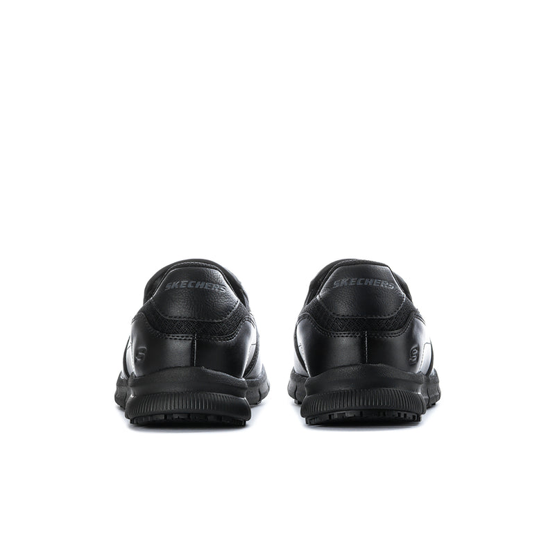 Men's black slip-on work shoe with Skechers heel branding and textured sole