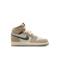 Kids high-top sneakers in beige and off-white with green swoosh and tan ankle collar