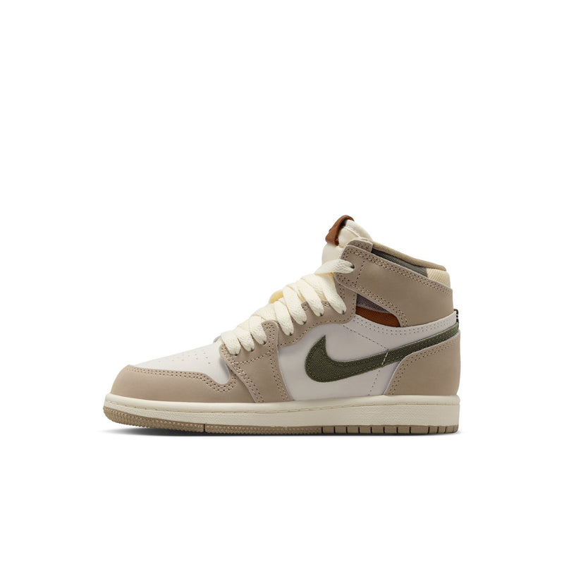 Kids high-top sneaker side view in beige and off-white with green swoosh and brown collar