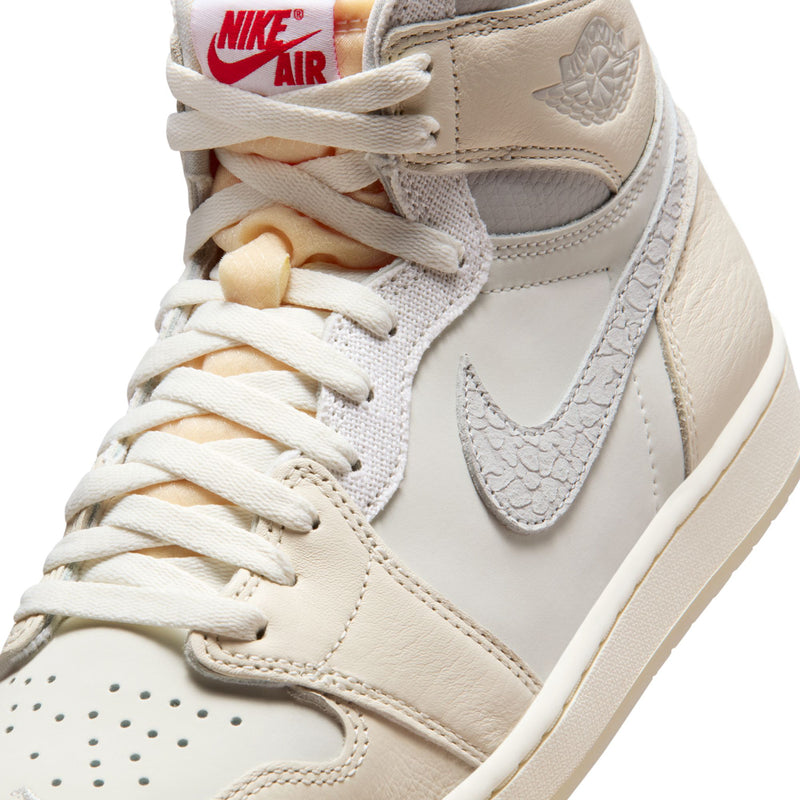 Men's cream high-top sneaker close-up, Nike Air tongue tag, Swoosh on side