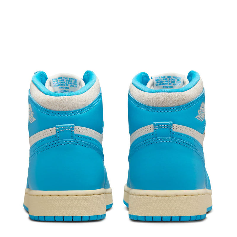 Youth high-top sneakers heel view, blue back panels with white midsole.