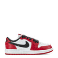 Kids low-top sneakers in red, white, and black with black lace-up