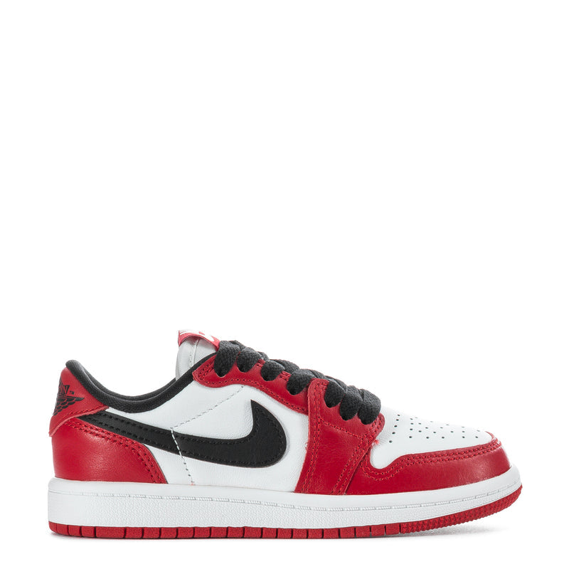 Kids low-top sneakers in red, white, and black with black lace-up