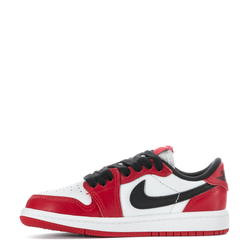 Kids low-top sneakers, red and white leather with black Nike Swoosh and laces