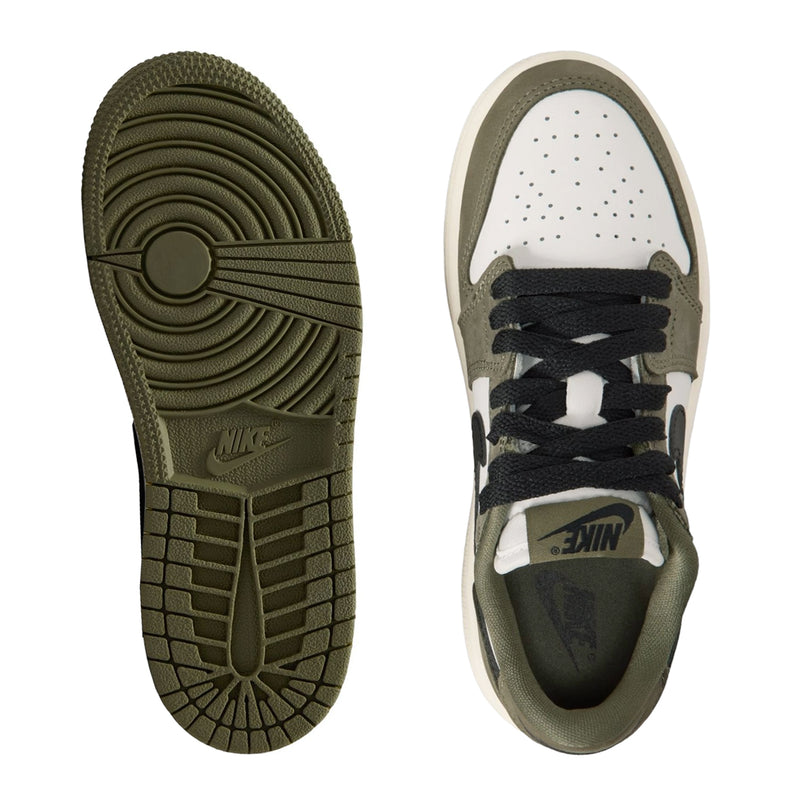 Kids sneakers soles view with olive traction outsole and white upper with black laces