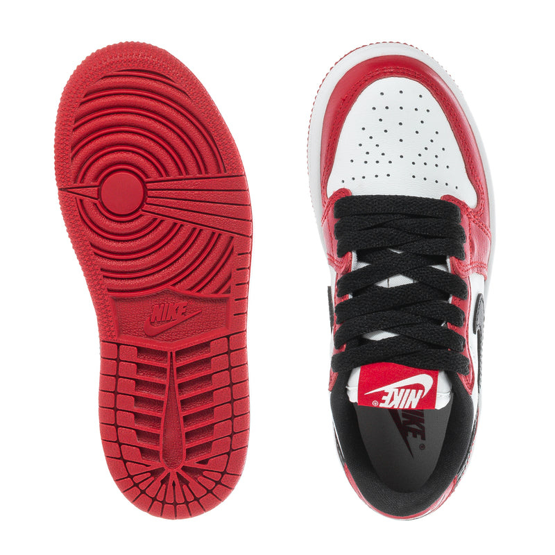 Kids sneakers outsole and insole view, red rubber sole with black laces