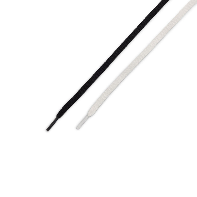 Pair of black and white flat shoelaces with aglets for toddler sneakers
