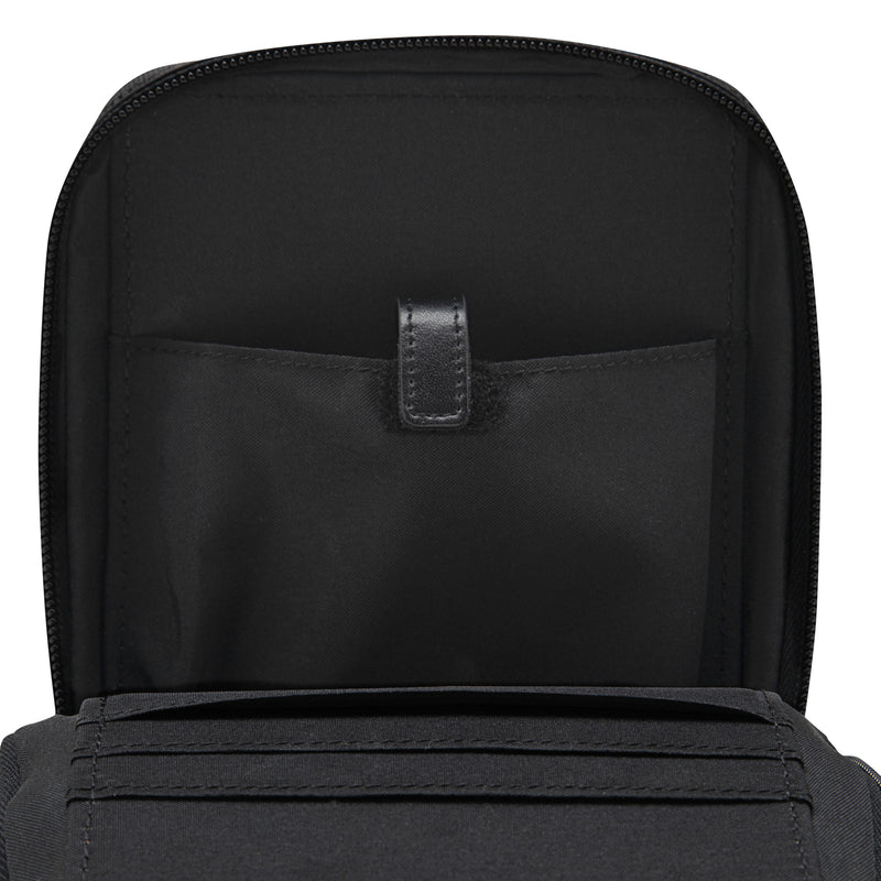 Black bag interior with zip closure and front divider pocket