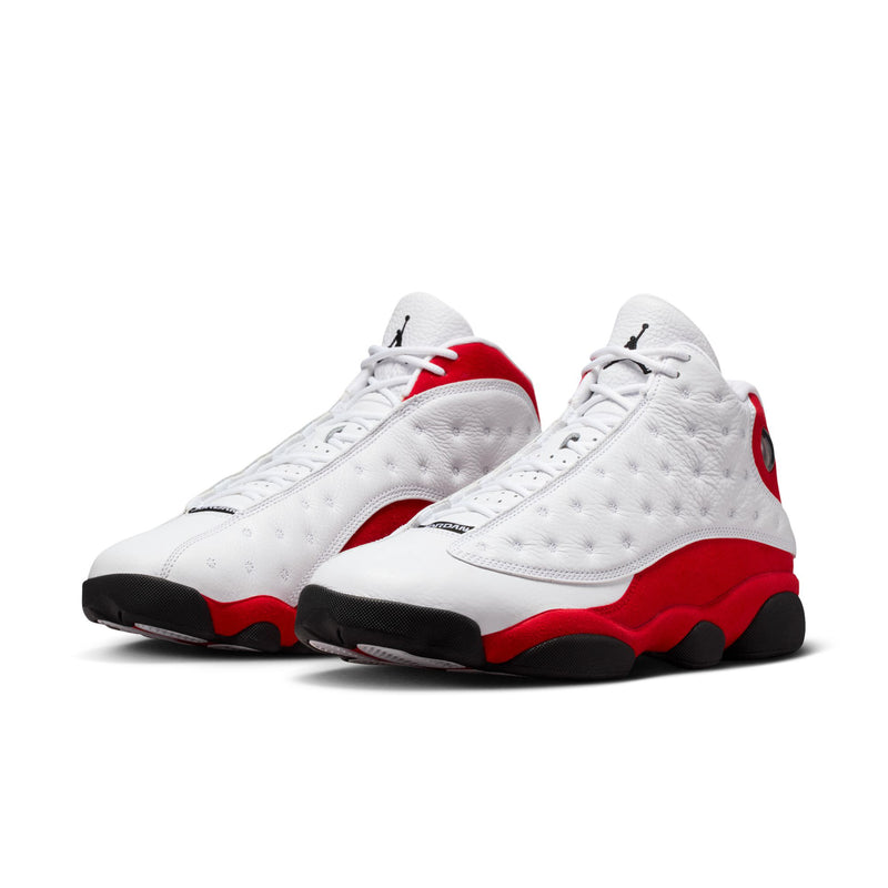Pair of white and red high-top sneakers with black outsole and lace-up front