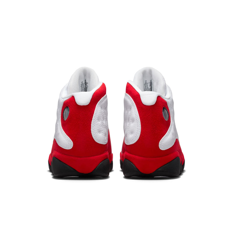 Heel view of white and red high-top sneakers with black heel detailing