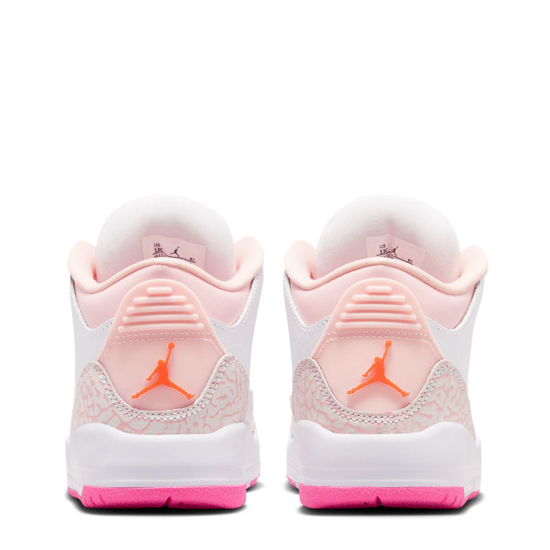 Kids high-top sneaker heel view, white and pink uppers with orange Jumpman logo, pink sole