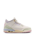 Youth low-top sneakers in white with sage green and pink accents