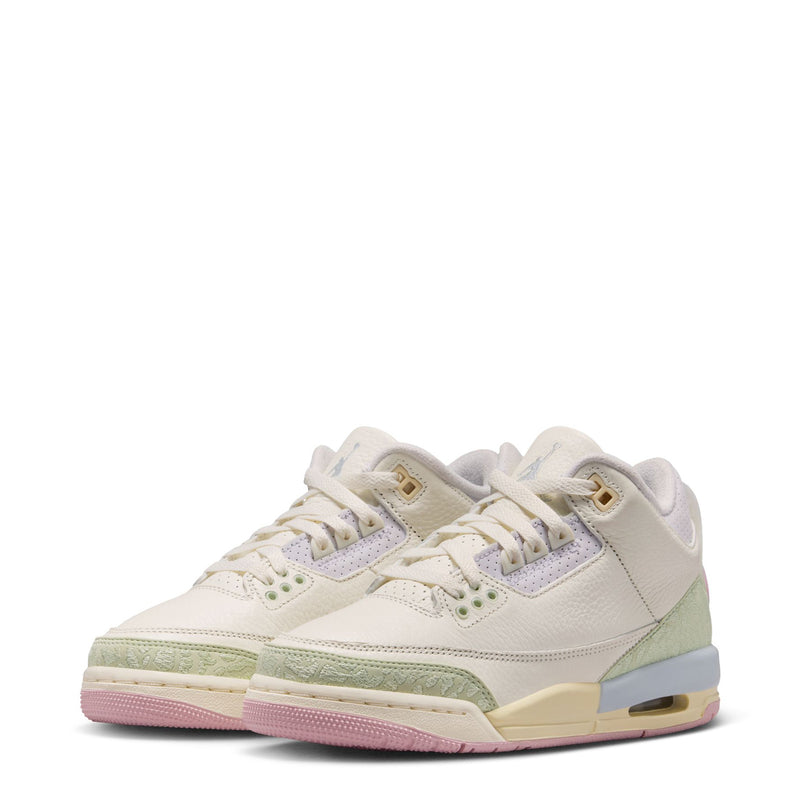 Youth low-top sneakers with white upper, sage side panel and visible Air unit