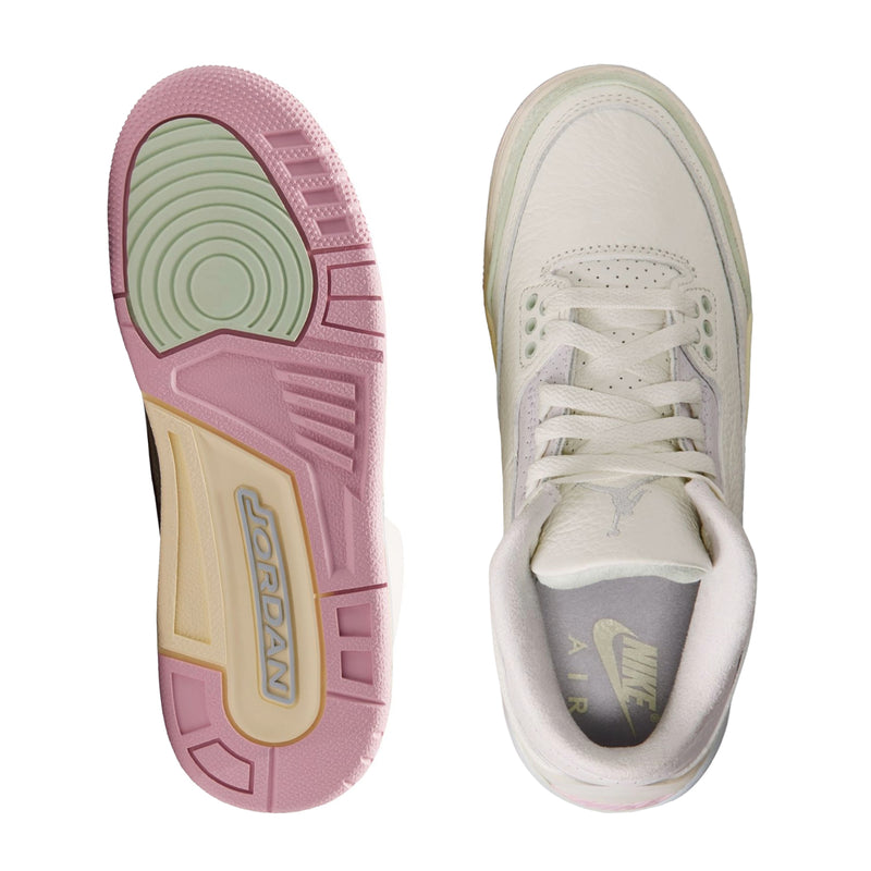 Shoe outsole and interior, pale white with pink tread and Nike logo