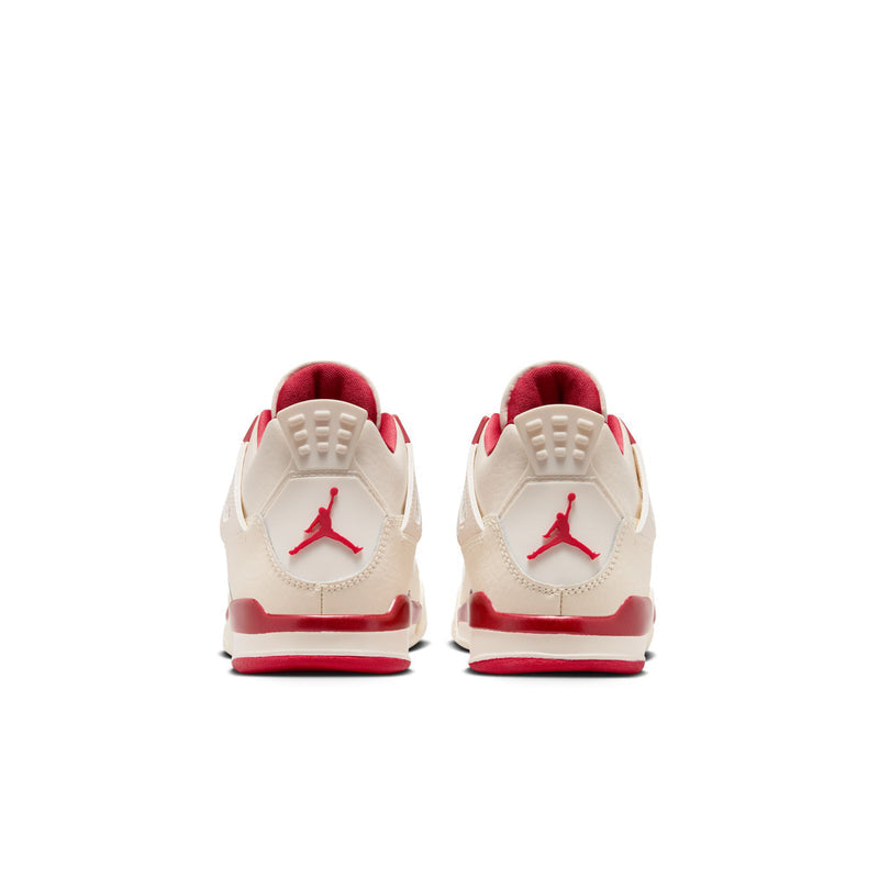 Kids retro sneakers in pale ivory with red heel tabs and Air Jordan-style logo