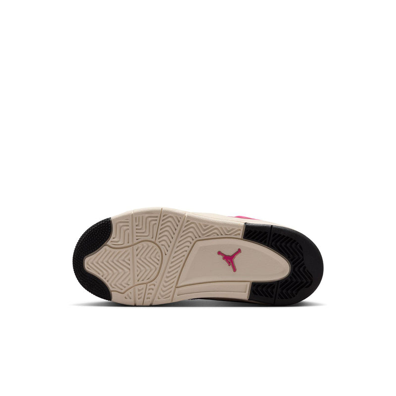 Kids' sneaker outsole with textured tread and Air Jordan logo on light beige section