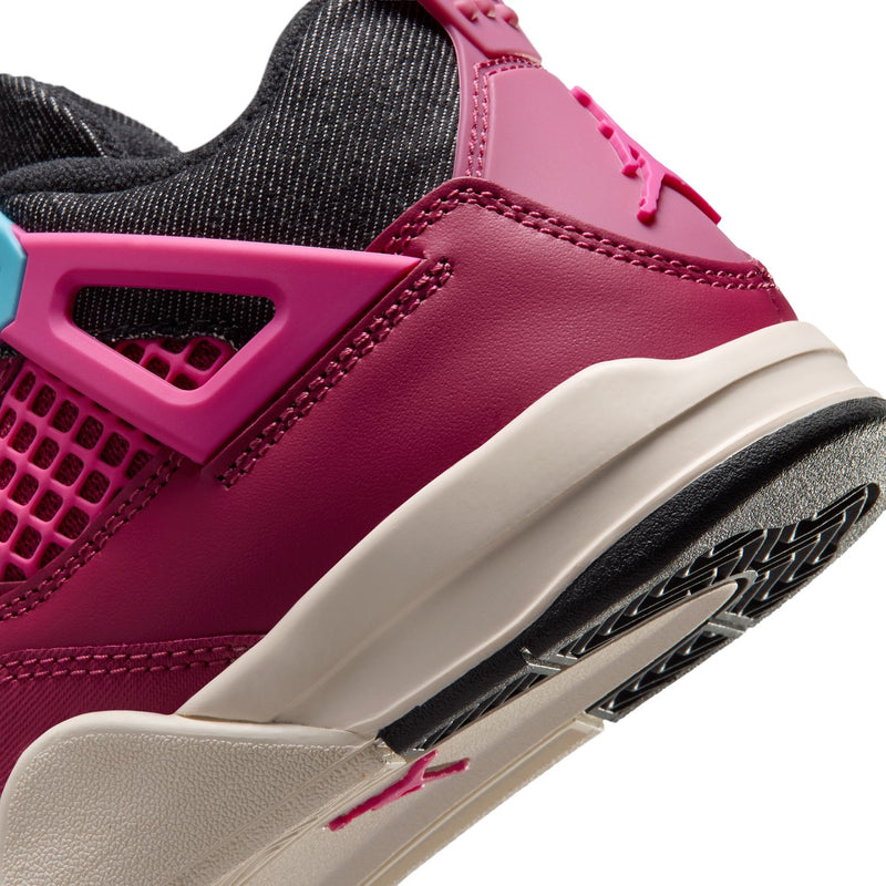 Close-up side view of kids' burgundy sneaker with teal panel and white midsole edge