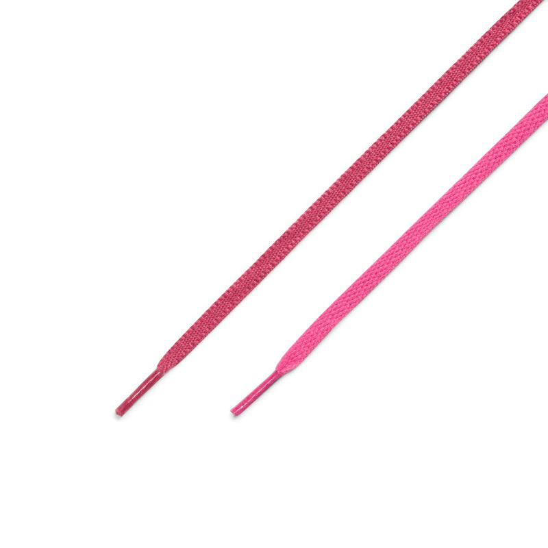 Pair of bright pink shoelaces
