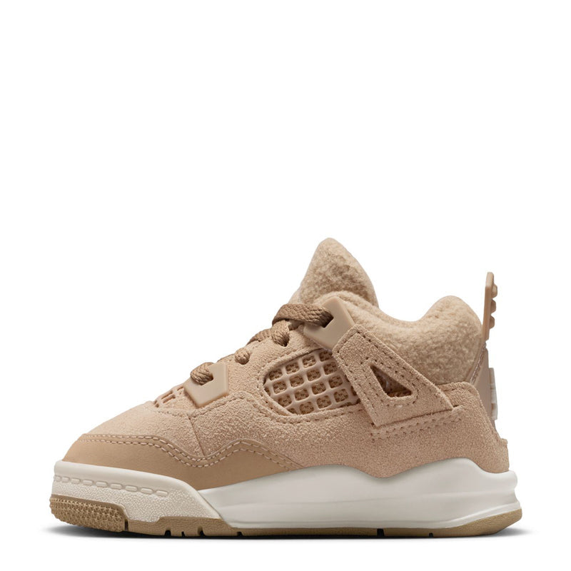 Tan toddler sneaker, side view with mesh window, wing eyelets, and lace-up